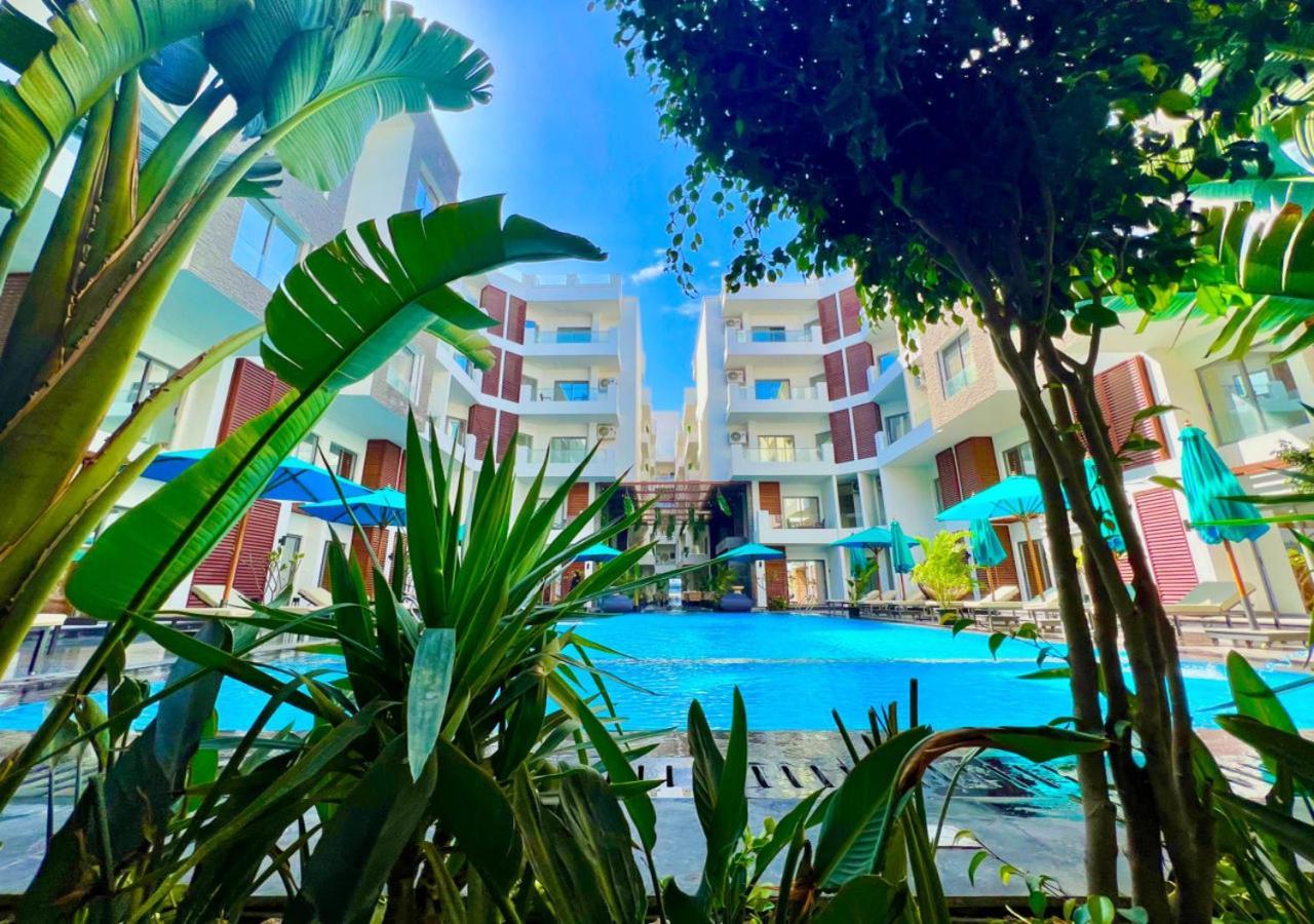 Sanctuary Sunlit Hurghada Haven With 4 Pools, Rooftop Sunsets & Gourmet Bites Steps Away Exterior photo